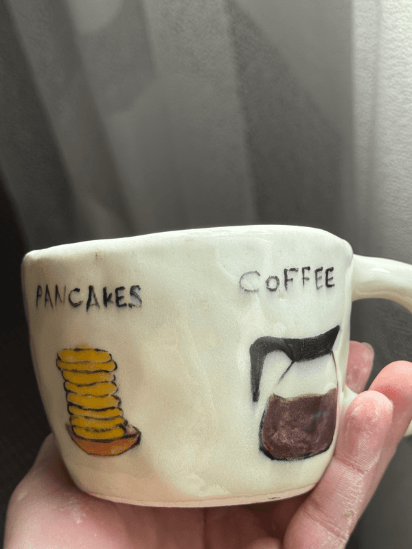 كوب الإفطار من متجر كوب الفخار