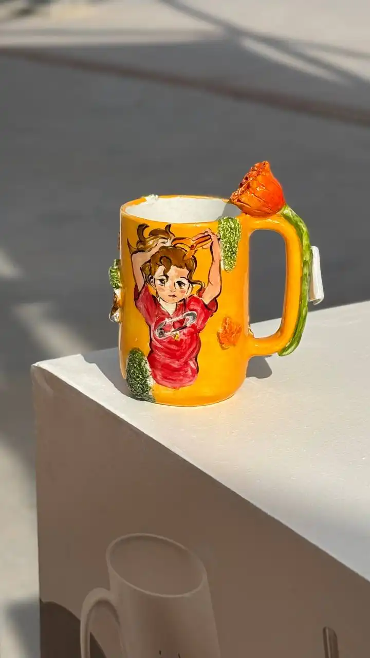 كوب شخصية آريتي المقترضة من متجر اكواب سُكر