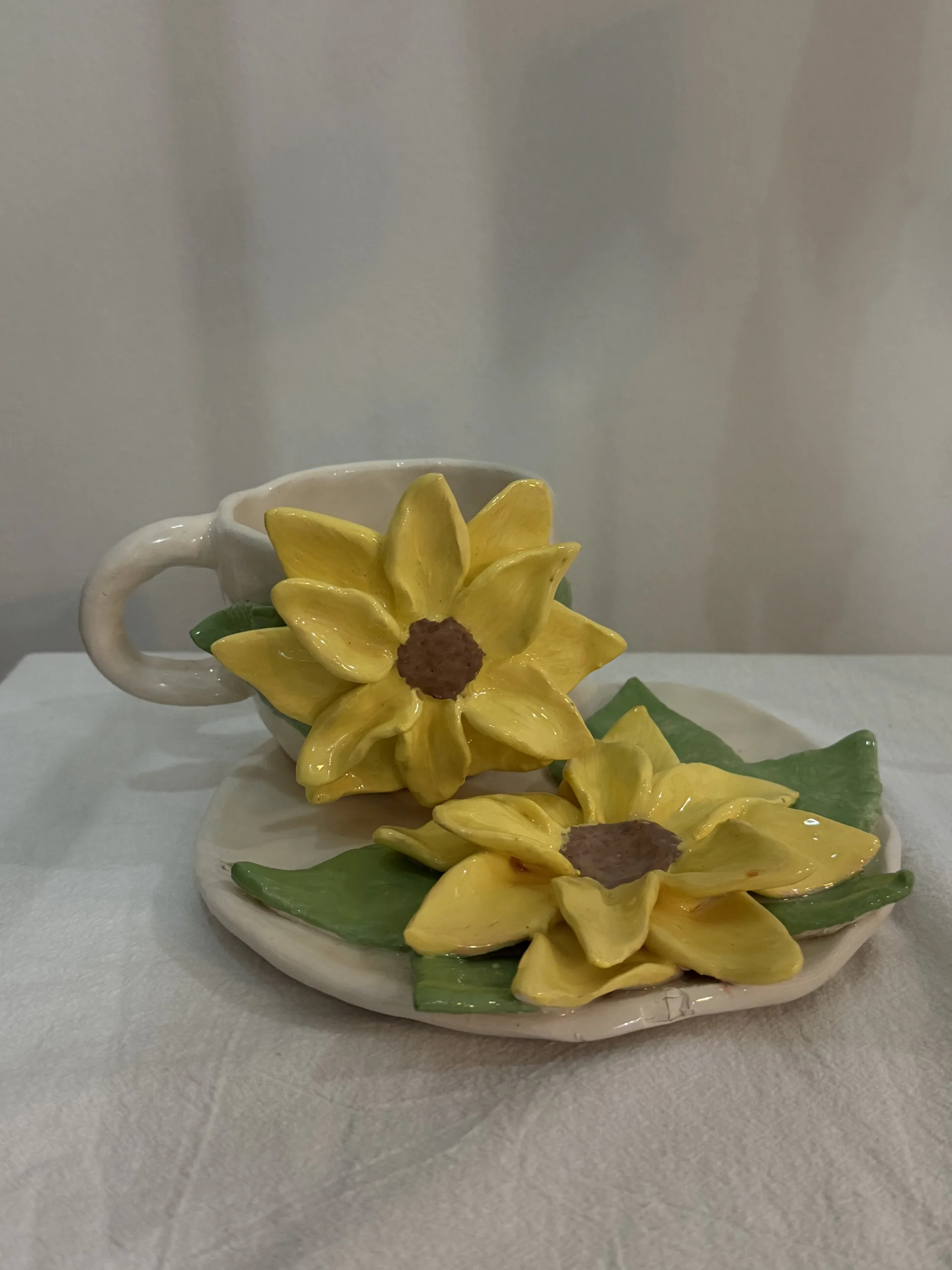 كوب وردة تباع الشمس أصفر من متجر ستوديو قارڤ