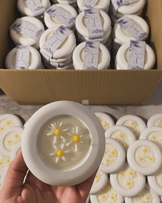 شمعة معطرة من متجر شموع ريڤولينا