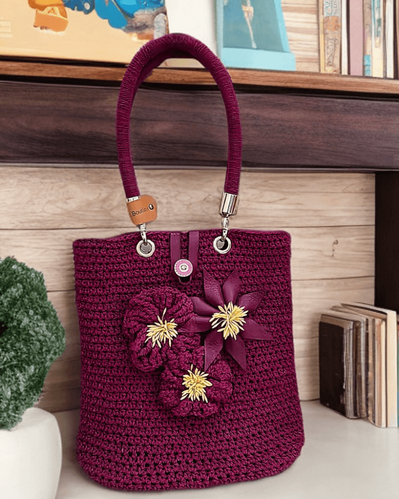 صورة حقيبه كروشيه بأزهار عودي - كروشيه بوتيك