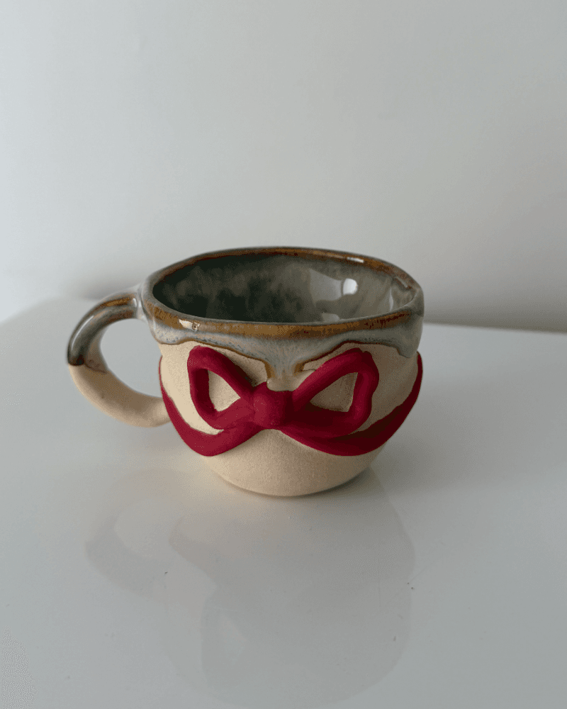 كوب الفيونكة الحمراء من متجر نيلدا بوتري