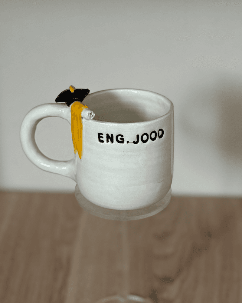 كوب تخرج من متجر متجر مونـ